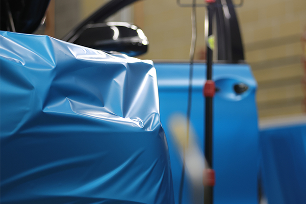 Close up of a car being wrapped